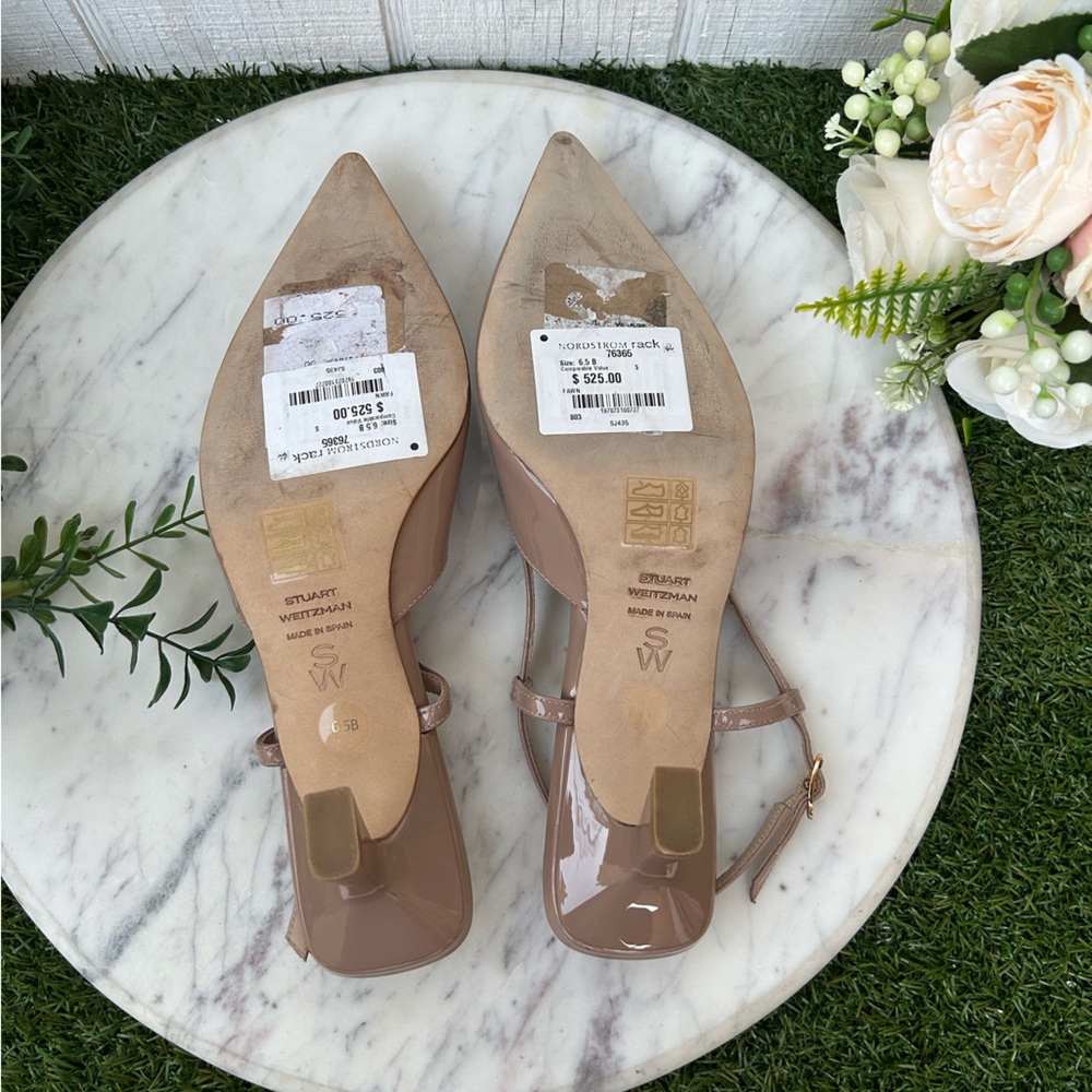 Stuart Weitzman
Vinnie Patent Kitten Slingback Pumps
$525
50mm BEIGE 6.5B NEW - Picture 16 of 16